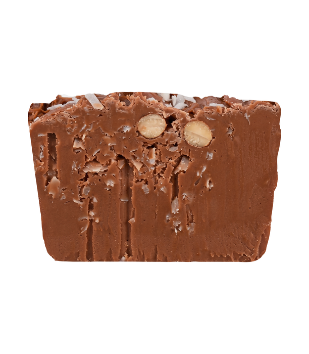 A rectangular piece of chocolate fudge with visible chunks of coconut and sliced almonds, presented on a solid white background.