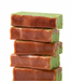 Five stacked rectangular pieces of caramel apple fudge shown on a plain white background.