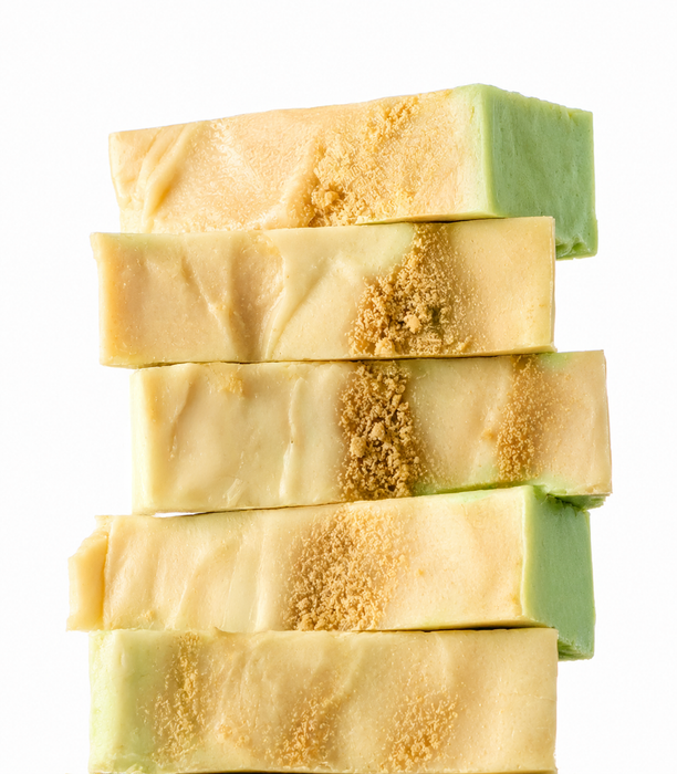 A stack of five handmade Key Lime Pie Slices on a white background.