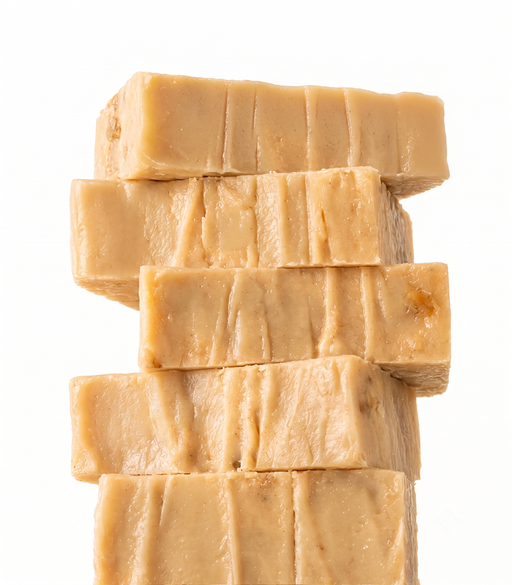 Stack of gourmet Maple Walnut Fudge on a white background