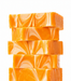 Stack of orange creamsicle handmade fudge on a white background
